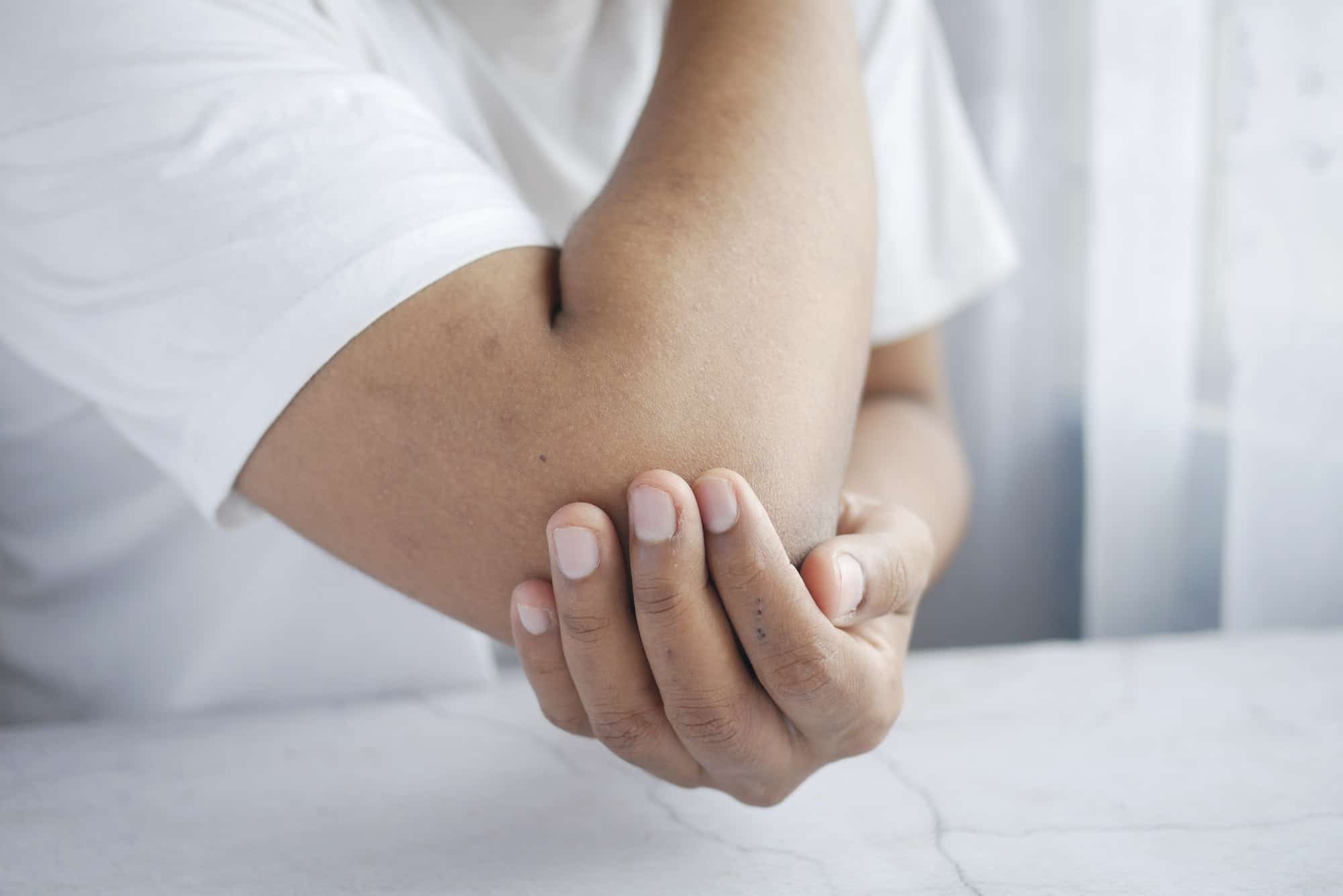 man with elbow pain, Pain relief concept.