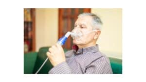 old man nebulizing